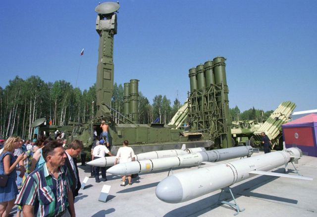 росія