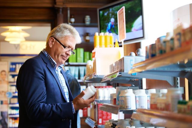 Man shopping for vitamins