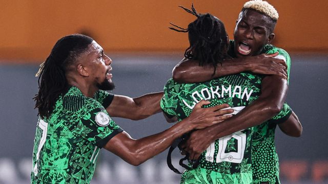 Nigerian players celebrating after a goal