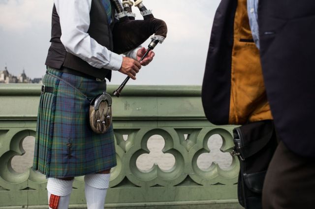 Man playing bagpipes