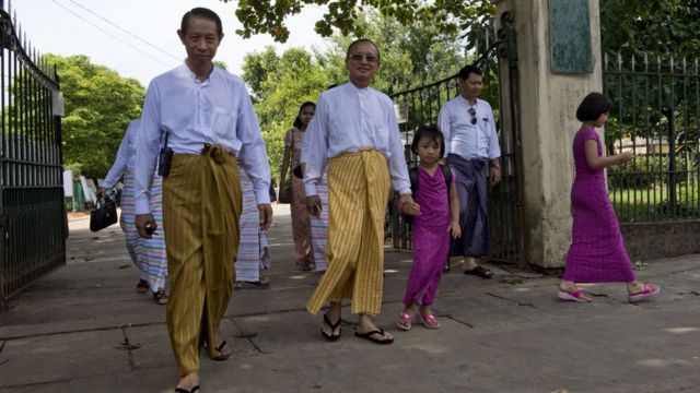 Men wearing longyi in Myanmar (file image)