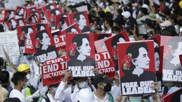 Demonstrators hold placards calling for the release of detained civilian leader Aung San Suu Kyi during a protest against the military coup, in Yangon, Myanmar, 25 February 2021