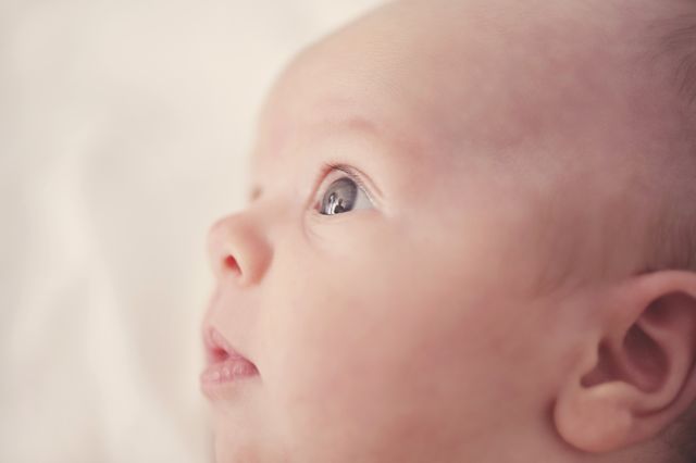 New-born baby gazing upwards