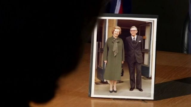 Framed photo of Margaret Thatcher.