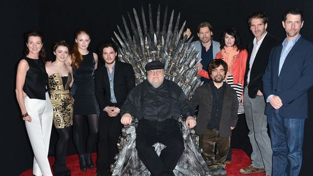 George R.R. Martin (centre) posing with some of Game of Thrones' protagonists