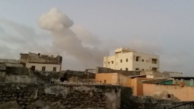 Smoke rises from a street in Mogadishu after the bombing