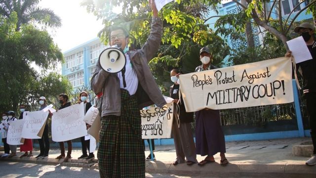 People protest on the street against the military after Monday's coup, outside the Mandalay Medical University in Mandalay, Myanmar February 4, 2021