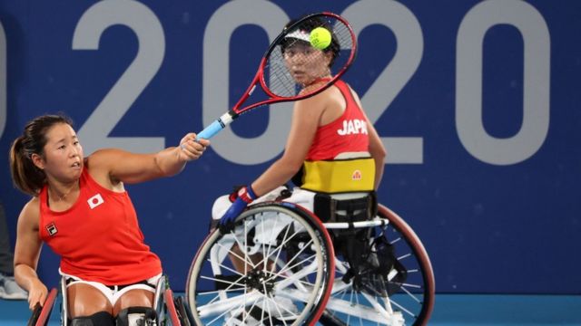 Tokyo 2020 Paralympic Games - Wheelchair Tennis - Women's Doubles Bronze Medal Match - Ariake Tennis Park, Tokyo, Japan - September 4, 2021. Yui Kamiji of Japan and Momoko Ohtani of Japan in action against Ziying Wang of China and Zhenzhen Zhu of China REUTERS/Ivan Alvarado