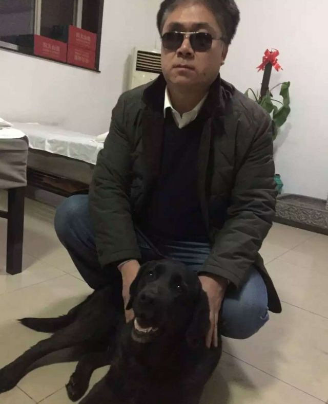 ティアンさんと盲導犬のチャオチャオ