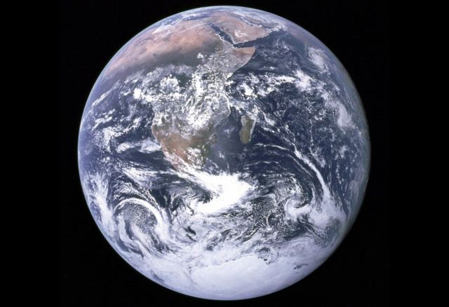 The Blue Marble - Earth taken from space taken on 7 December, 1972. The image became part of the official Earth Day flag. It is not known which of the three astronauts - Eugene Cernan, Ron Evans, and Harrison Schmitt - took the photo, as all three men have always claimed it as their own.