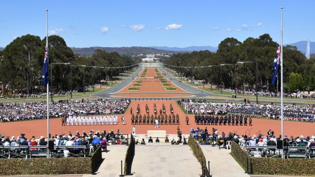 A guard of honour arrives during a Remembrance Day ceremony at the Australian War Memorial, in Canberra, Australia, 11 November 2018