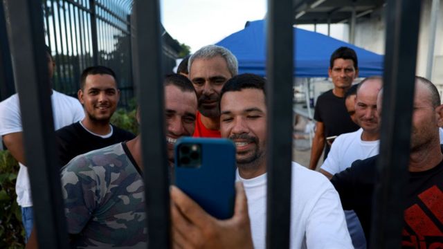 Cuban migrants who arrived by sea in the South Florida Keys on January 5 wait to be released after turning themselves in to US authorities.