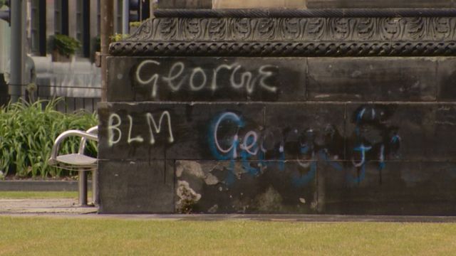 george floyd, Graffiti appeared on Melville Monument after the Black Lives Matter protest, with "BLM" and "George Floyd" written at the base.