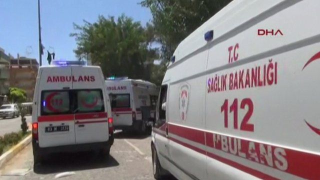 Ambulances arrive at the scene in Suruc