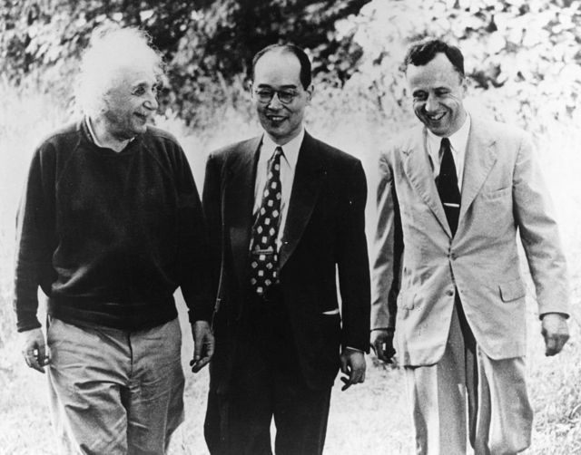 Albert Einstein, Hideki Yukawa, and John Archibald Wheeler in conversation at Princeton, 1954.