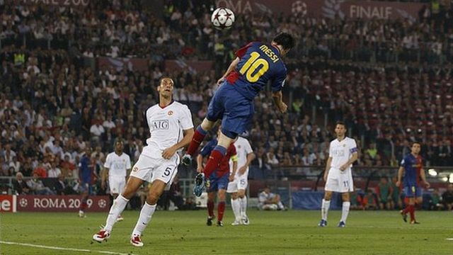Lionel Messi scores against Manchester United in the 2009 Champions League final