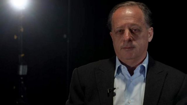 Richard Sharp in a studio during a BBC interview