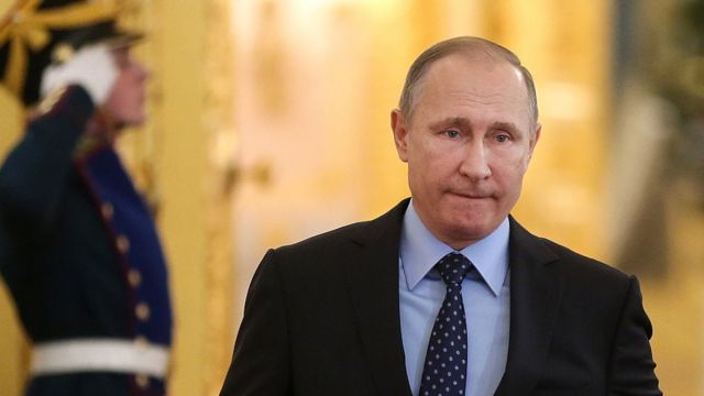 путін