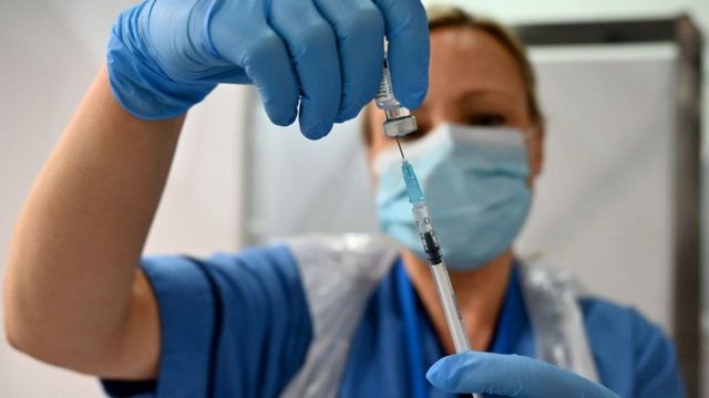 Nurse preparing for vaccination