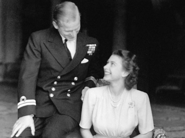 Princess Elizabeth and her fiance, Lieutenant Philip Mountbatten, at Buckingham Palace.