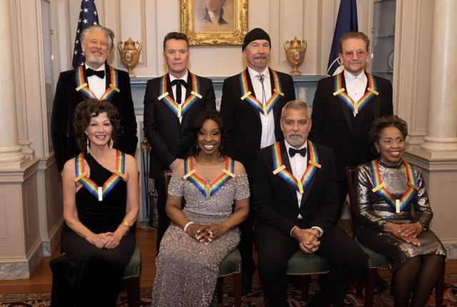 This year's honorees: Back row (left to right) U2 members: Adam Clayton, Larry Mullen Jr., The Edge and Bono.  Front row (left to right) Amy Grann, Gladys Knight, George Clooney and Talia Lyonne