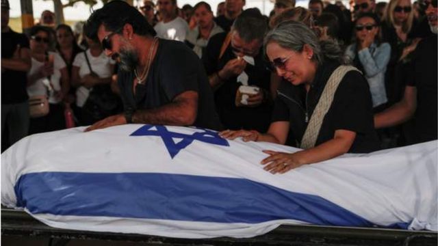 Family members and relatives mourn at the funeral of Antonio Macias who was killed during the Hamas attack on a music festival near Raim last weekend