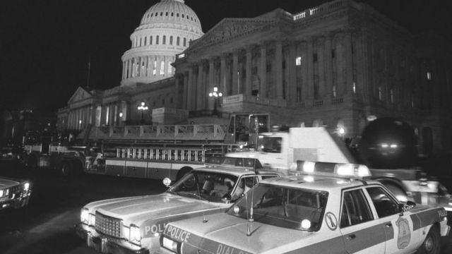 Police cars outside the Capitol after the attack in 1983.
