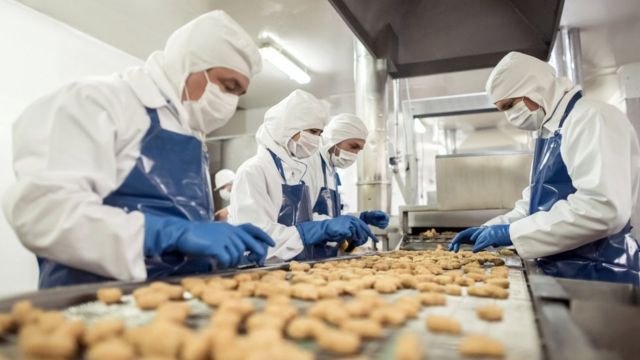 People working at a food factory