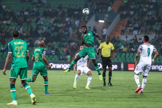 Comoros forward Youssouf Ibroihim fly high to head ball against Ghana