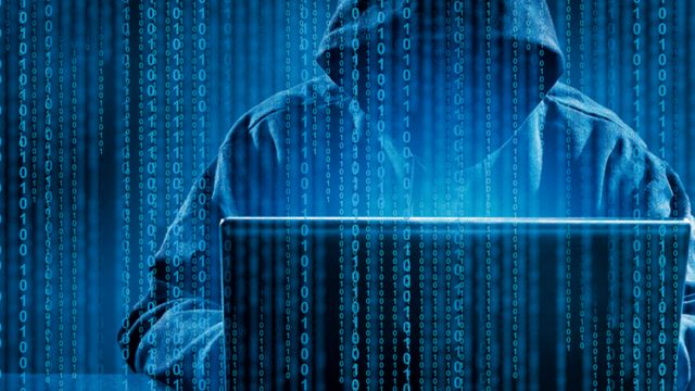 Hacker on laptop