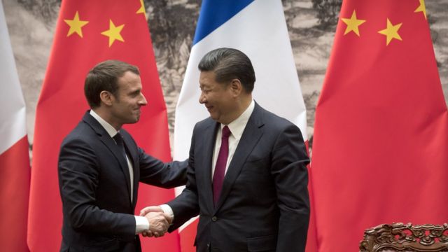 Emmanuel Macron y Xi Jinping.