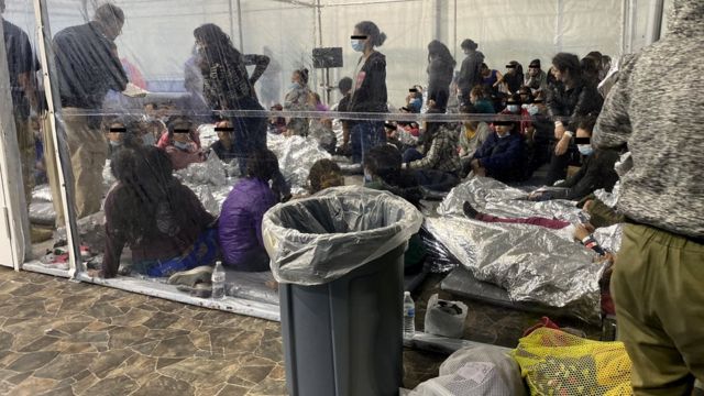 Migrants at the US Customs and Border Protection temporary processing centre in Donna, Texas, 22 March 2021