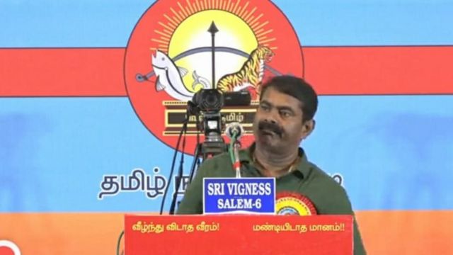 சீமான் பேசும் மேடையில் மூவேந்தர் சின்னம் பொறித்த கொடி