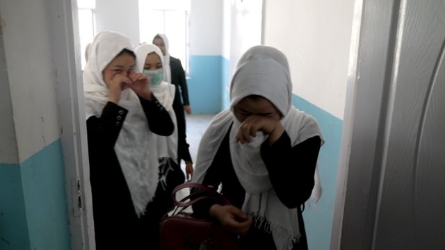 Girls in tears on hearing the news at the Sayed ul Shuhada school in Kabul on 23 March, 2022.