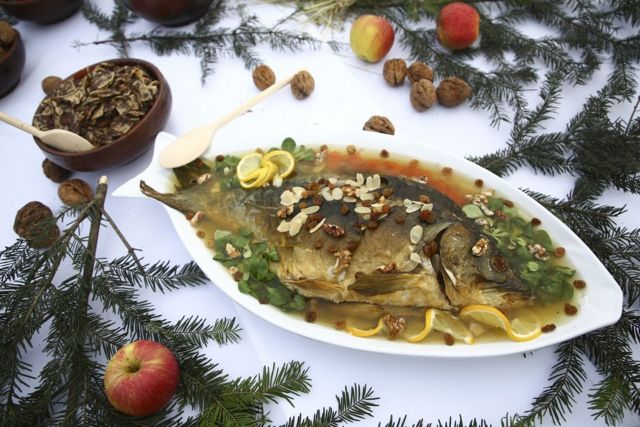 A traditional jellied carp at the Christmas Eve Supper for the homeless and poor at the Main Square in Krakow, Poland