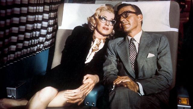 Marilyn con David Wayne en 'Cómo casarse con un millonario'.