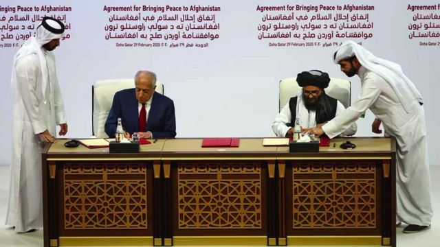 US and Taliban representatives sign an agrement