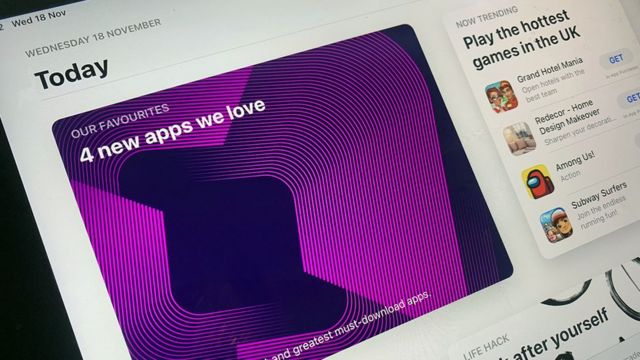 Apple slashes commission fees to developers on its App Store - BBC News