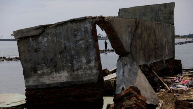 Shoreline debris seen in Indonesia after flooding