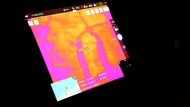 A screen showing the view from a drone's thermal camera