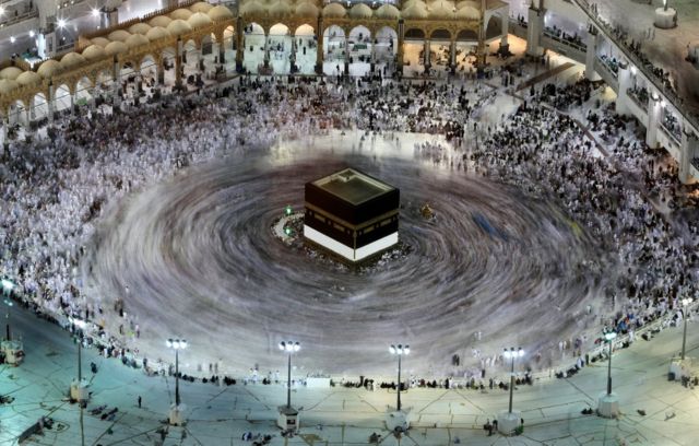This long exposure photograph shows Muslim pilgrims circumambulating the Kaaba, Islam's holiest shrine, at the Grand Mosque in Saudi Arabia's holy city of Mecca on August 27, 2017, prior to the start of the annual Hajj pilgrimage.