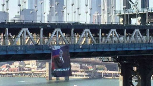 Putinin plakatı