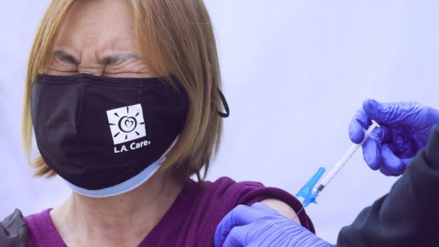 Shanyu Ye receives a Covid-19 vaccination dose outside the Karsh Family Social Service Center on March 18, 2021 in Los Angeles, California.