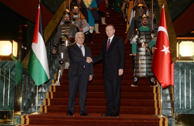 Palestinian President Mahmoud Abbas (left) shakes hands with Turkish President Recep Tayyip Erdogan during a visit to Ankara in 2015