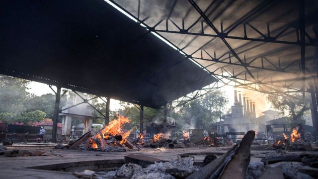 Multiple burning pyres of patients who died of the Covid-19 coronavirus infections at a crematorium on 17 April 2021 in Delhi, India