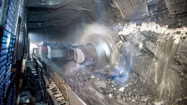 A coal-cutting machine in a tunnel at a coal mine operated by Beijing Haohua Energy Resource co.