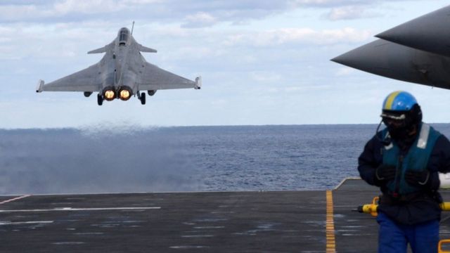 A French fighter takes off from the aircraft carrier Charles de Gaulle in the Mediterranean