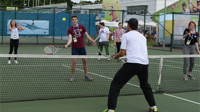 Artem Sitak and School Reporters playing tennis