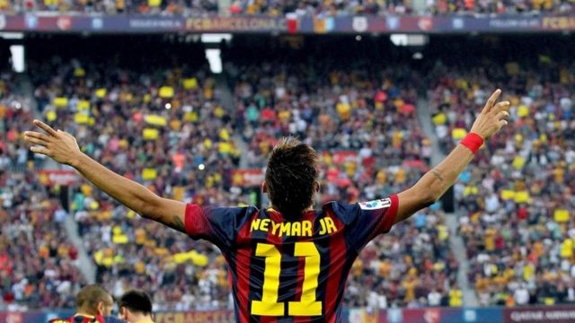 L'attaquent brésilien Neymar célèbre un but contre le Real Madrid.