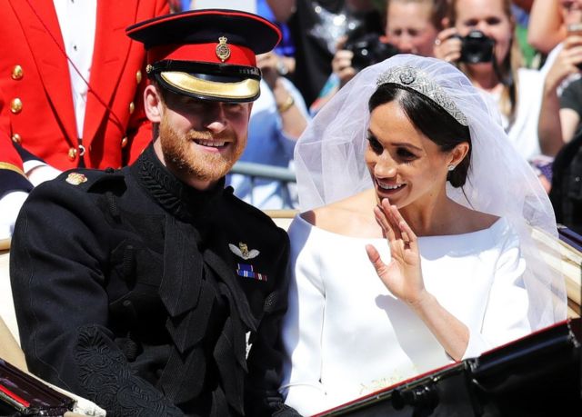 Prince Harry, Duke of Sussex and the Duchess of Sussex in the Ascot Landau carriage during the procession after getting married
